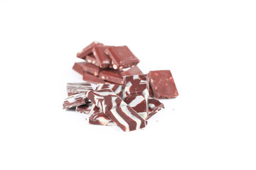 slices of original black and white chocolate.isolated on white