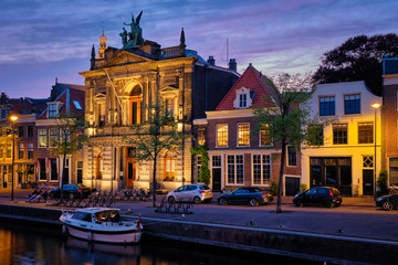 Fototapeta na wymiar Canal and houses in the evening. Haarlem, Netherlands