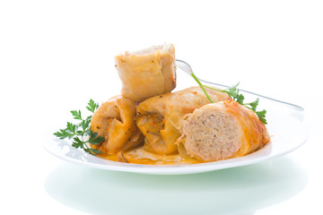 Stuffed cabbage leaves with minced meat and rice in tomato sauce.