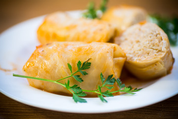 Stuffed cabbage leaves with minced meat and rice in tomato sauce.