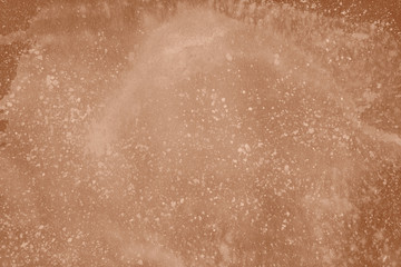 Orange spring watercolor texture with abstract washes and brush strokes on the white paper background. Chaotic abstract organic design.