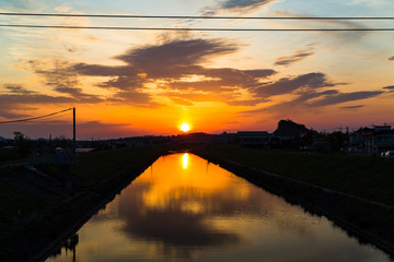 河口に沈む夕陽