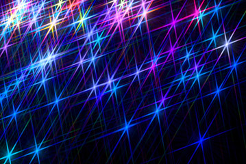 Fototapeta premium Glowing rays on a black background