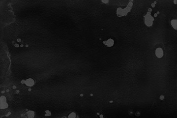 Black watercolor texture with abstract washes and brush strokes on the white paper background. Chaotic abstract organic design.