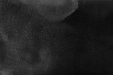 Black watercolor texture with abstract washes and brush strokes on the white paper background. Chaotic abstract organic design.