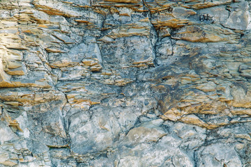 The texture of stones and minerals, in the context of the earth. Stone background for design.