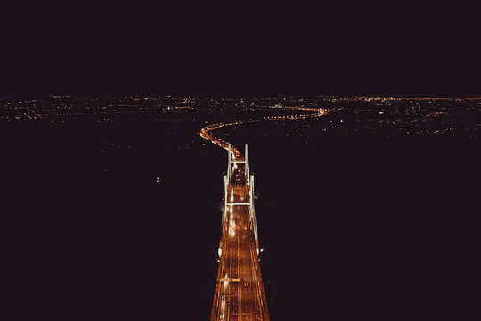 Bridge at night with traffic cars Warsaw city Poland