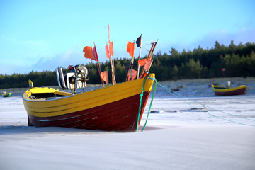 Typical fishing boats on a beach in Debki coastal village , Baltic Sea, Poland