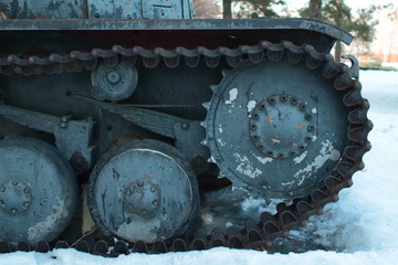 German battle tank 2nd World War Tiger in the snow under the trees.