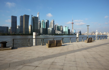 Empty marble road surface floor with Shanghai Skyline