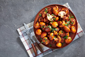 close-up of tasty spicy lightly fried mushrooms