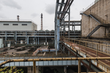 Fototapeta na wymiar Industrial buildings in an abandoned factory