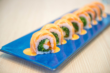 Roll sushi with salmon, spicy roll , cream cheese. Sushi menu. Japanese food