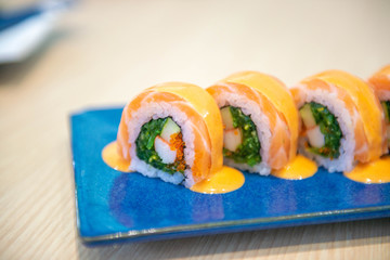 Roll sushi with salmon, spicy roll , cream cheese. Sushi menu. Japanese food