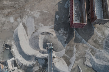 Aerial view of crushed stone quarry machine in a construction material factory 