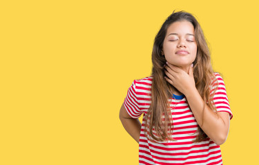 Young beautiful brunette woman wearing stripes t-shirt over isolated background Touching painful neck, sore throat for flu, clod and infection