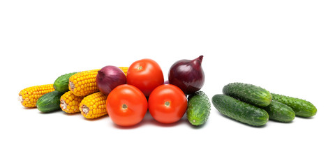 cucumbers and other vegetables on a white background