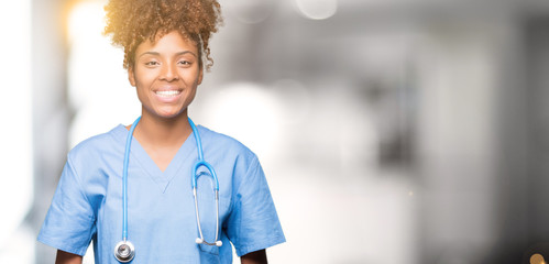 Young african american doctor woman over isolated background Hands together and fingers crossed...