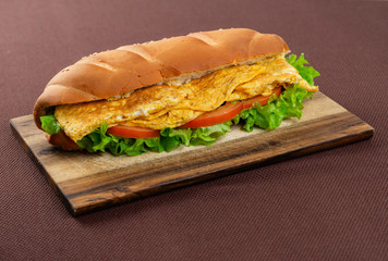 sandwich on wooden board