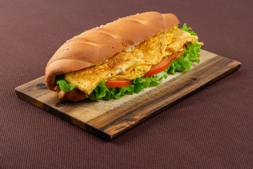 sandwich on wooden board