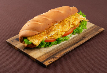 sandwich on wooden board