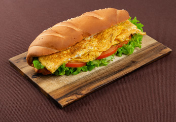 sandwich on wooden board