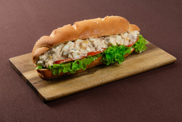 sandwich on wooden board