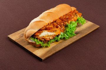 sandwich on wooden board