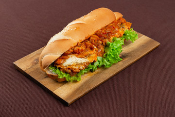 sandwich on wooden board