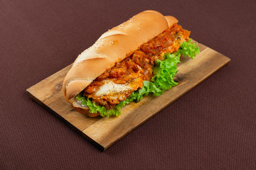 sandwich on wooden board