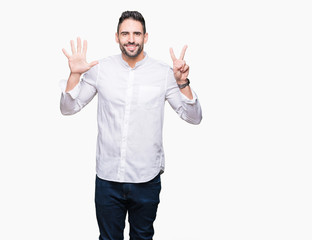 Young business man over isolated background showing and pointing up with fingers number seven while smiling confident and happy.