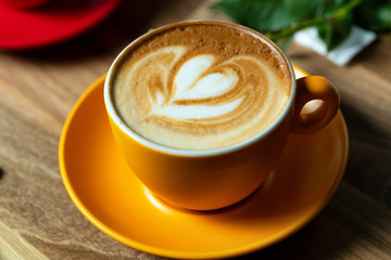 Fresh cup of coffee with decoration