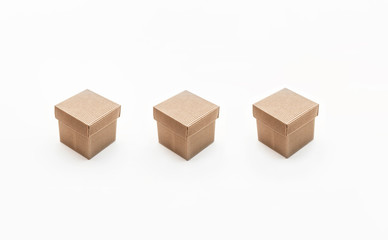 Three isolated cardboard boxes on white background