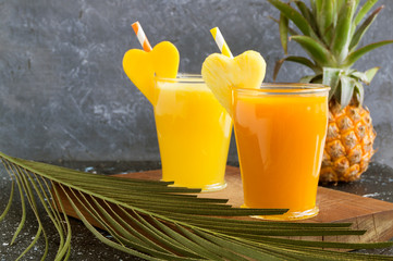 Fototapeta na wymiar Pineapple juice in a jar with a straw.