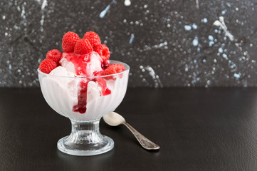Ice cream balls in a glass vase.