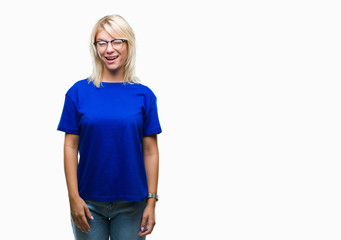 Young beautiful blonde woman wearing glasses over isolated background winking looking at the camera with sexy expression, cheerful and happy face.