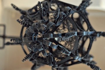 Fototapeta premium Products made of ferrous metal. Forged products on the fence.