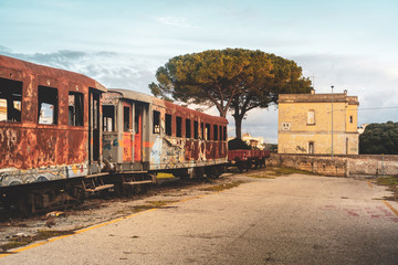 Fototapeta na wymiar MANDURIA-ITALY/DECEMBER 2017: Abandoned train