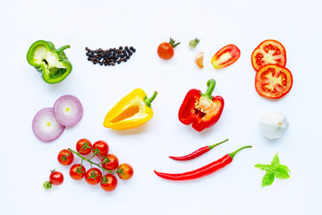 Various fresh vegetables and herbs on white background. Healthy eating concept