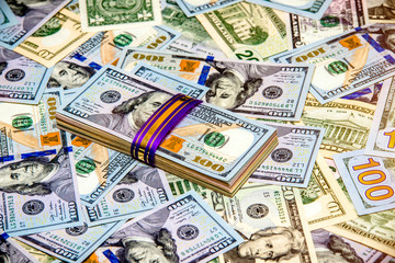 a pack of lies the US currency on background of dollars