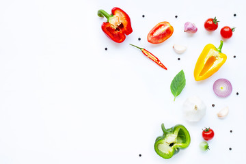 Various fresh vegetables and herbs on white. Healthy eating concept