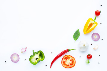 Various fresh vegetables and herbs on white. Healthy eating concept
