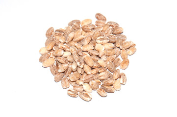 Pearl barley on a white background close-up view from above. diet and healthy eating