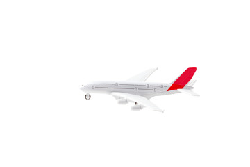 Isolated toy model of an airplane. Travel and air transport concept