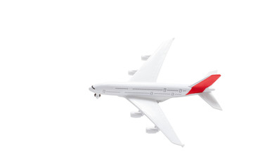 Isolated toy model of an airplane. Travel and air transport concept