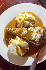 Chocolate tart with cream & caramel sauce 