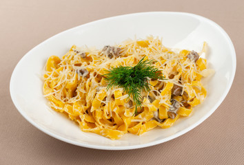 pasta with cheese in a white plate
