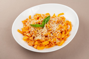 pasta with cheese in a white plate