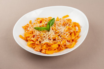 pasta with cheese in a white plate