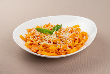 pasta with cheese in a white plate